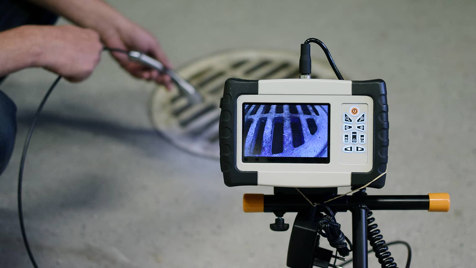 Expert CCTV Drain Surveys Drainage engineer performing a local cctv drain survey