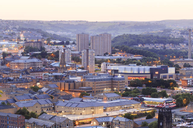 A panoramic view of Halifax, West Yorkshire, featuring the town’s skyline at dusk. Unblockers.net offers professional drain unblocking services throughout Halifax to keep drainage systems running smoothly.